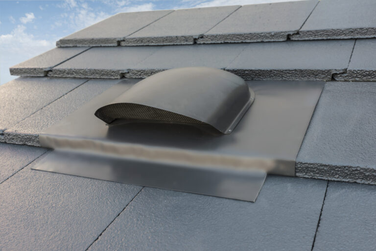 Black Low Profile roof vent on tiled roof